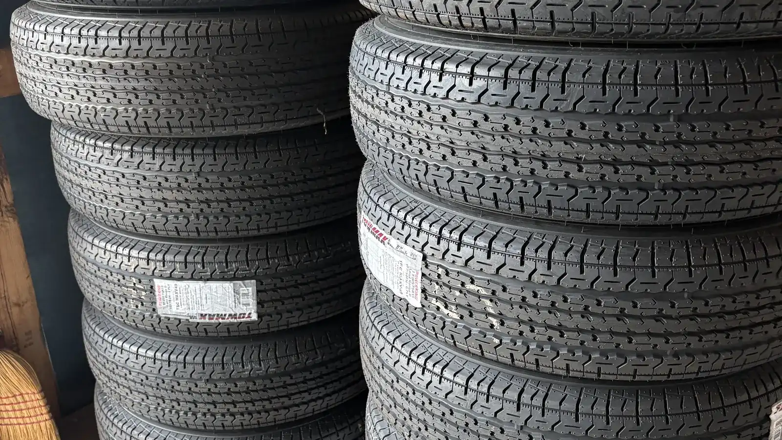 Stacks of ST radial trailer tires in stock at Grandville Trailer